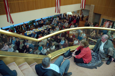 Seating was found for most of the large overflow crowd which viewed the talk via television monitor in the Library’s lobby.